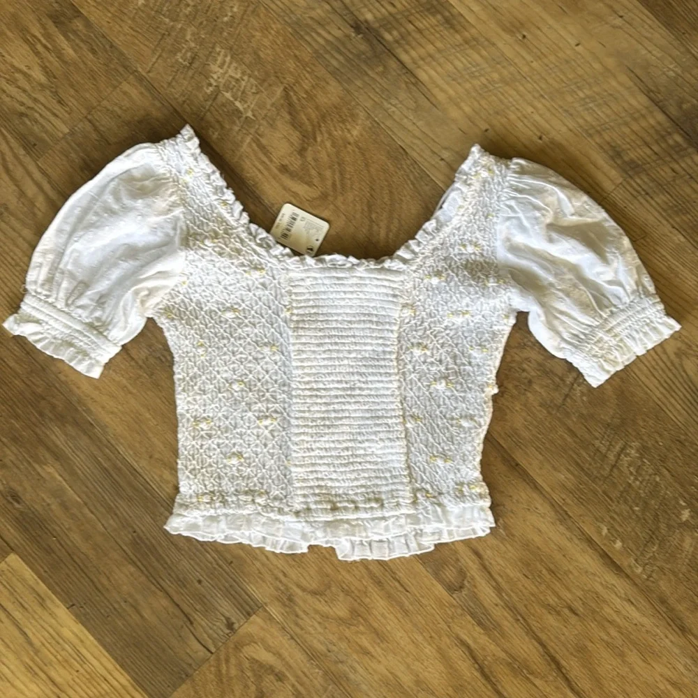NWT Free People Cecilia Puffy Sleeve Smocked Embroidered Rosette Top Size XS